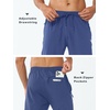 image:imageNORTHYARD Mens Athletic Pants Running Workout Gym Lightweight Quick Dry  Track Jogging Casual Sweatpants Sports Zipper Pockets Elastic Waist Breathable 4Way Stretch Cooling Reflective StripsFederalblue